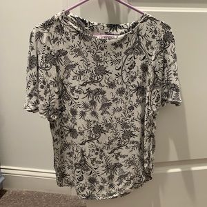 White and black floral top